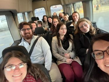 Social work students on the bus travelling to Charleston WV