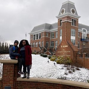 Marleah Knights with family in front of Woodburn Hall