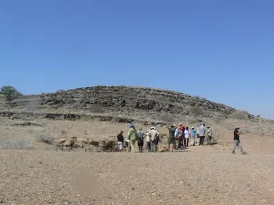 A field trip to Namibia to study volcanic rocks led to an unexpected discovery by West Virginia University geologists Graham Andrews and Sarah Brown.

While exploring the desert country located in southern Africa, they stumbled upon a peculiar land formation—flat desert scattered with hundreds of long, steep hills. They quickly realized the bumpy landscape was shaped by drumlins, a type of hill often found in places once covered in glaciers, an abnormal characteristic for desert landscapes. 
