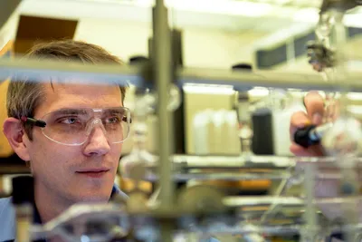 Carsten Milsmann, assistant professor in the C. Eugene Bennett Department of Chemistry at West Virginia University, has earned the National Science Foundation’s prestigious CAREER Award for research that could help develop solar energy applications that are more efficient and cheaper to produce.

Milsmann, alongside five WVU graduate students, hopes to develop new compounds using early transition metals. These are more widely available and cost effective than the precious metals typically used in new solar cell technology, which has been held back by these pricy materials. Iridium and ruthenium, for example, are far more expensive and rarer than platinum.