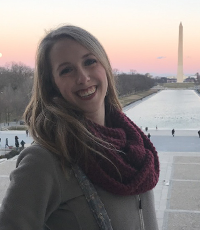Juliana Spradling smiling in front of the Washington Monument