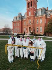 Kat Ramirez with forensic science classmates in front of Woodburn Hall
