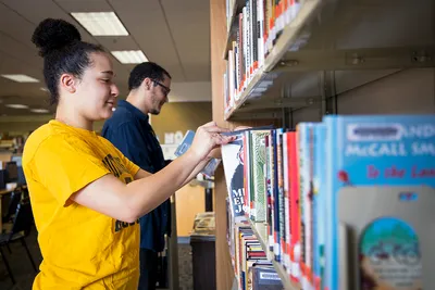 Since transferring to West Virginia University in fall 2017, Connecticut native Déja Fleury has found a home-away-from-home in Morgantown. Nearly three years later, the social work major is helping the local library feel more like home for its patrons. 