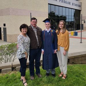 Quinn Makaela at Graduation with family