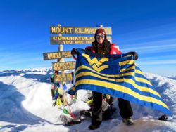 Francesca Basil on the summit of Mount Kilimanjaro.